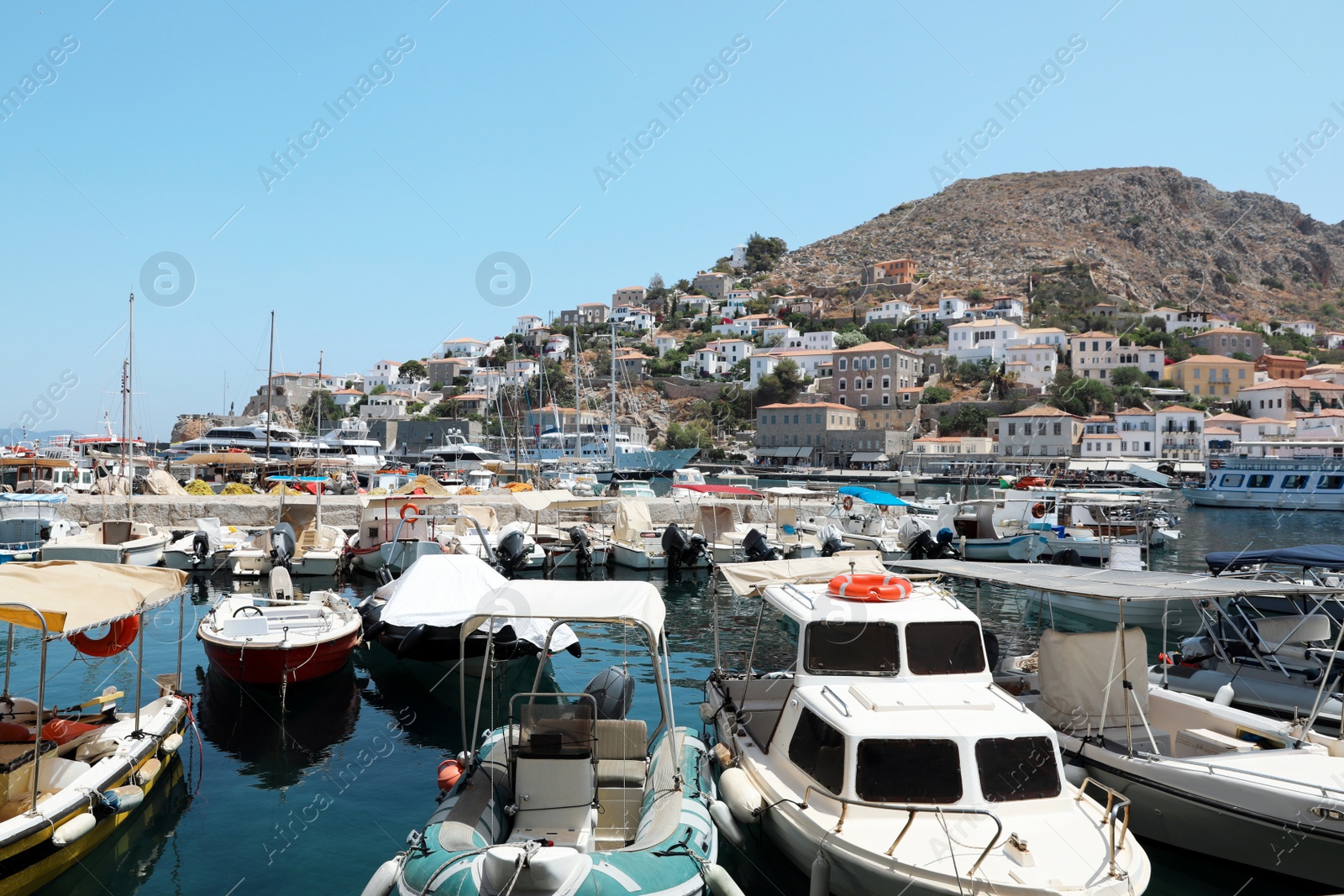 Photo of Beautiful view of port with different boats on sunny day