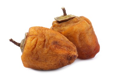 Tasty dried persimmon fruits on white background