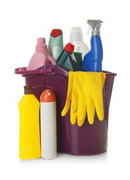 Photo of Bucket with cleaning supplies on white background