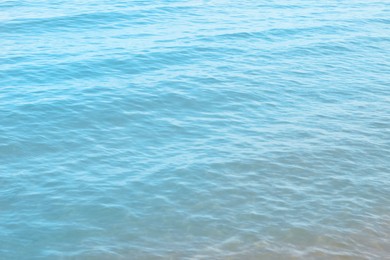 Photo of Beautiful sea water surface with ripples as background