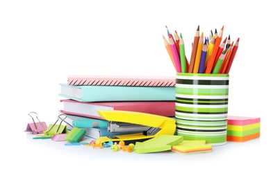 Photo of Different colorful stationery on white background. Back to school