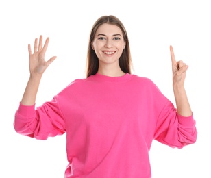 Woman showing number six with her hands on white background
