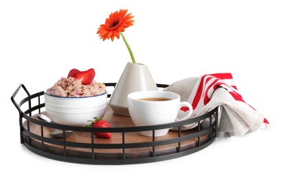 Tray with delicious breakfast and beautiful flower on white background