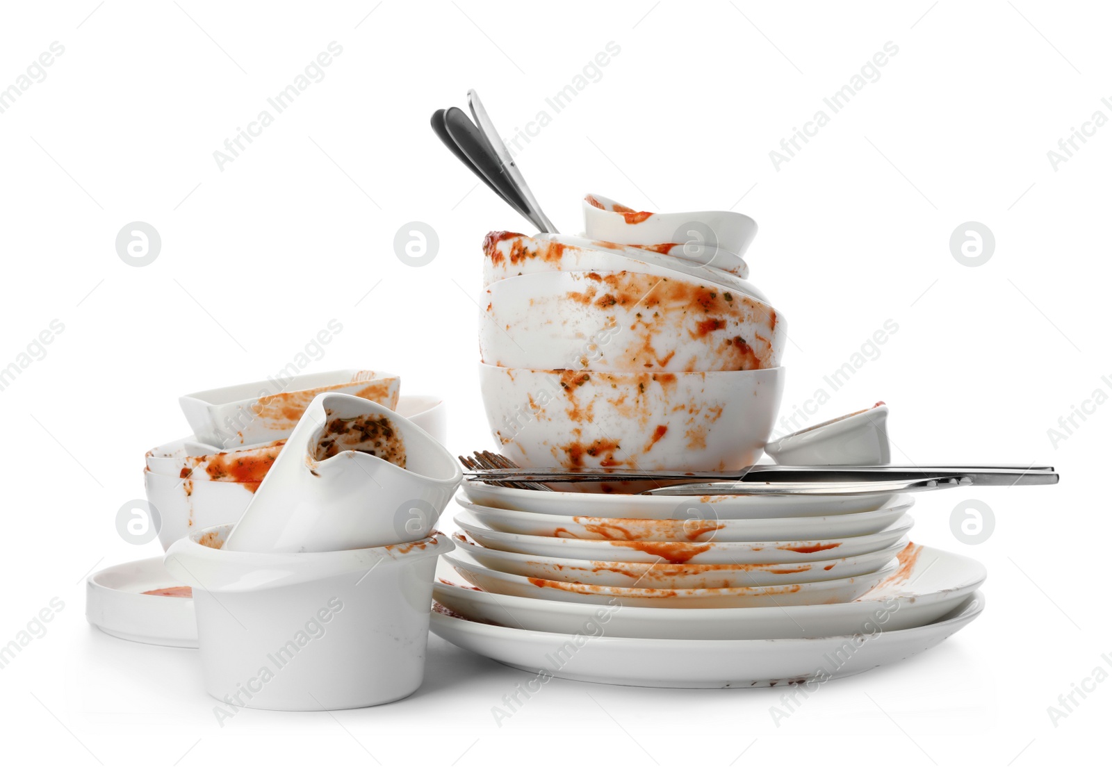 Photo of Set of dirty dishes isolated on white