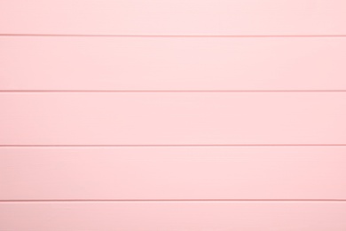 Photo of Pink wooden surface for photography, top view. Stylish photo background