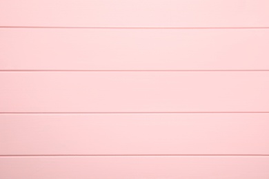 Pink wooden surface for photography, top view. Stylish photo background