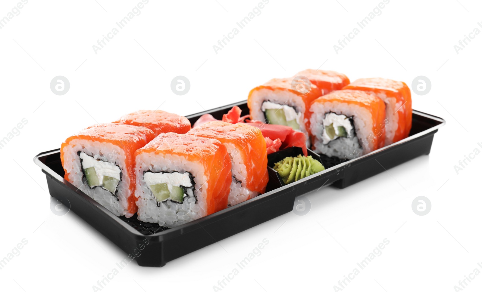 Photo of Box with tasty sushi rolls on white background. Food delivery