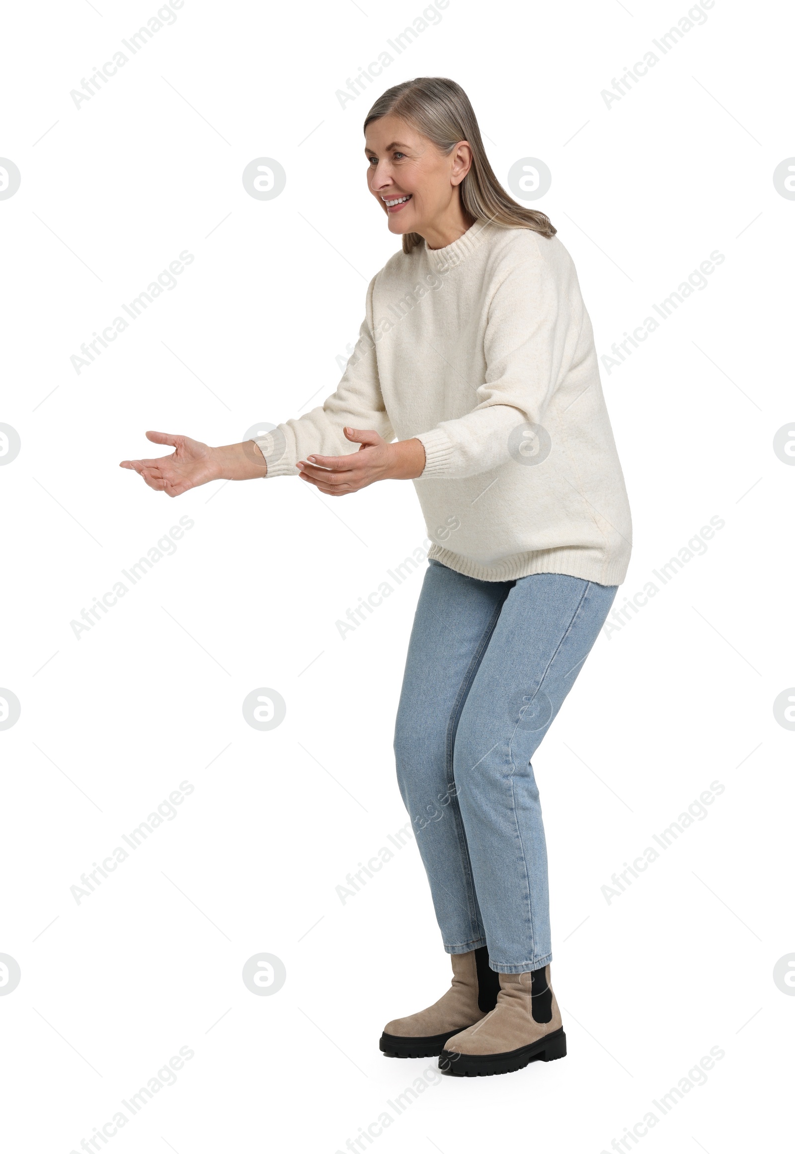 Photo of Senior woman greeting someone on white background