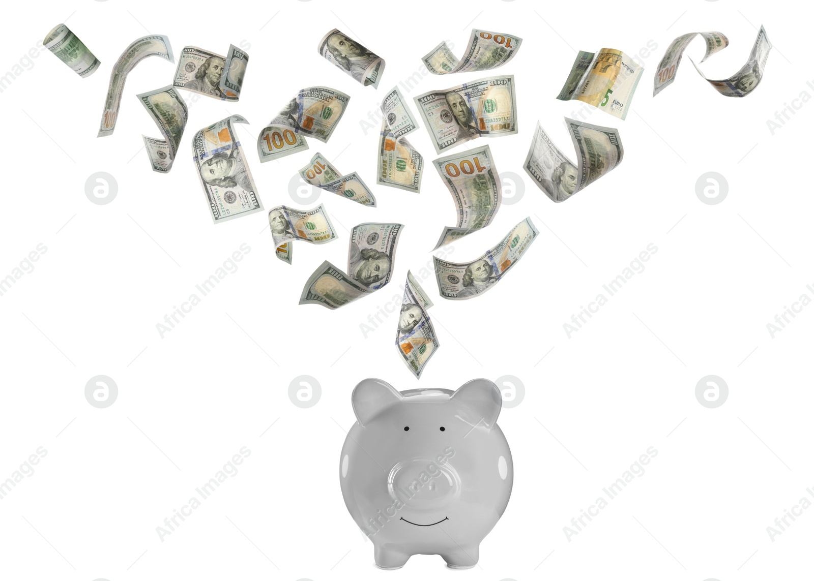 Image of Dollar banknotes falling into piggy bank on white background