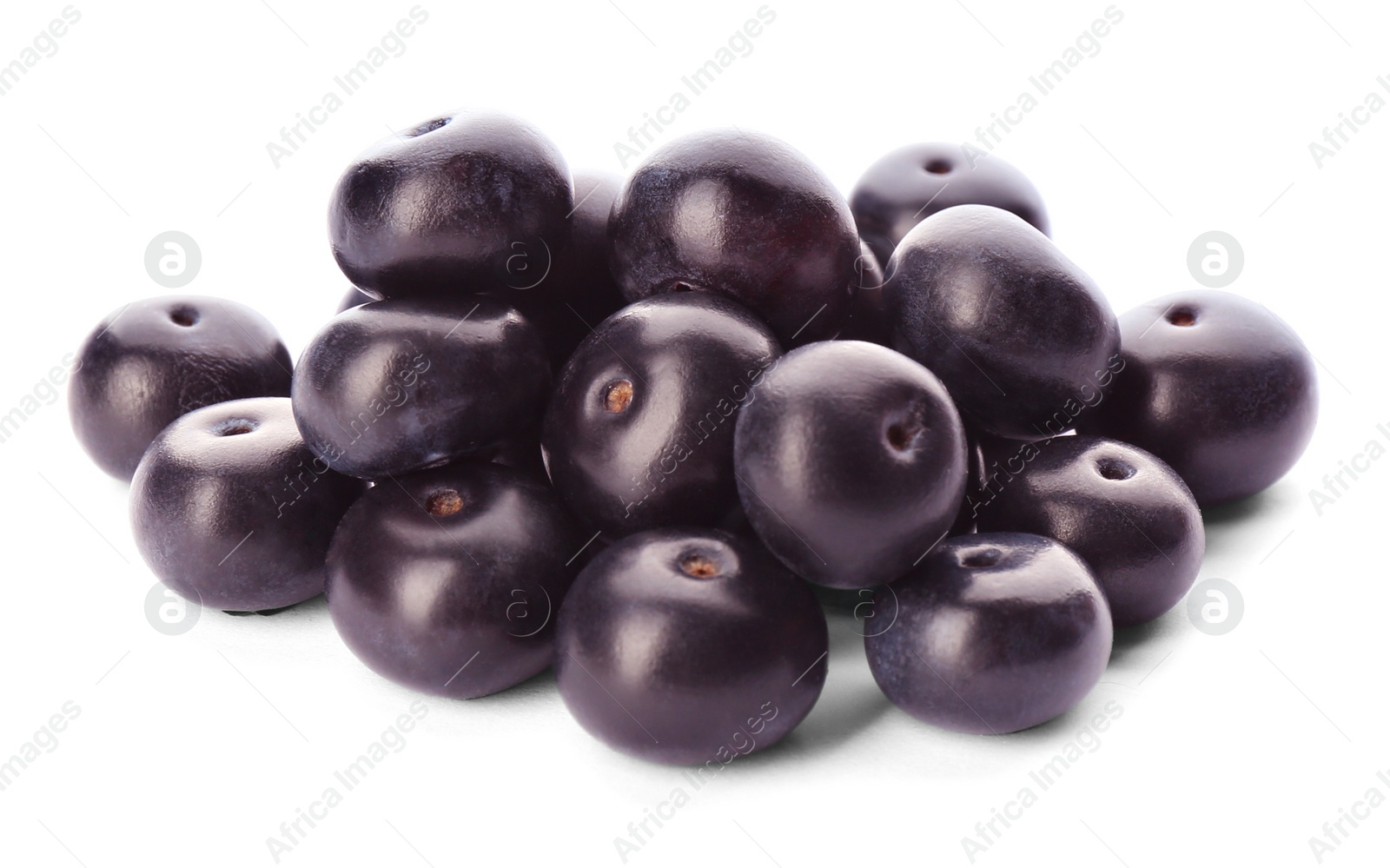 Photo of Pile of fresh acai berries isolated on white