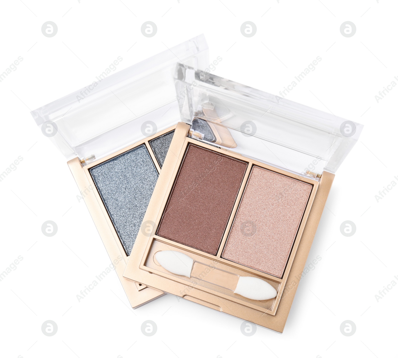 Photo of Beautiful eye shadow palettes with brushes isolated on white, top view