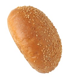 Photo of One fresh burger bun with sesame seeds isolated on white