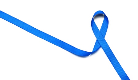 Photo of Blue ribbon on white background. Colon cancer awareness concept