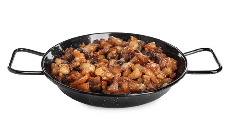 Tasty cracklings in frying pan isolated on white. Cooked pork lard