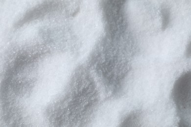 Photo of Organic white sea salt as background, closeup