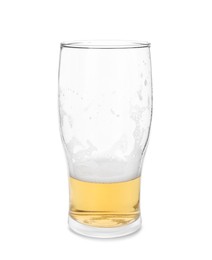 Almost empty glass of beer isolated on white