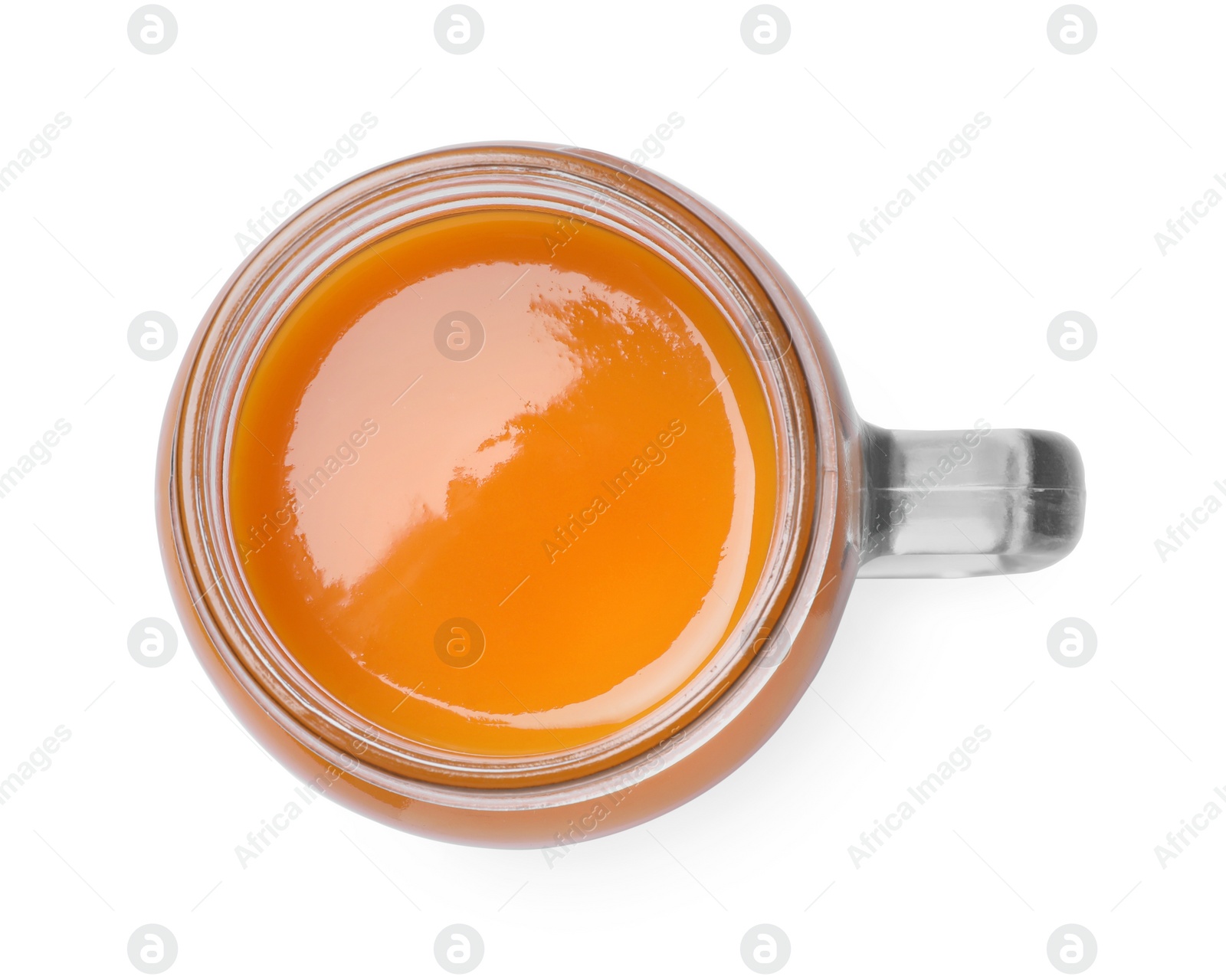 Photo of Fresh carrot juice in mason jar on white background, top view