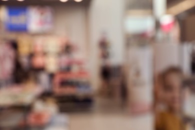 Blurred view of shopping mall interior. Bokeh effect