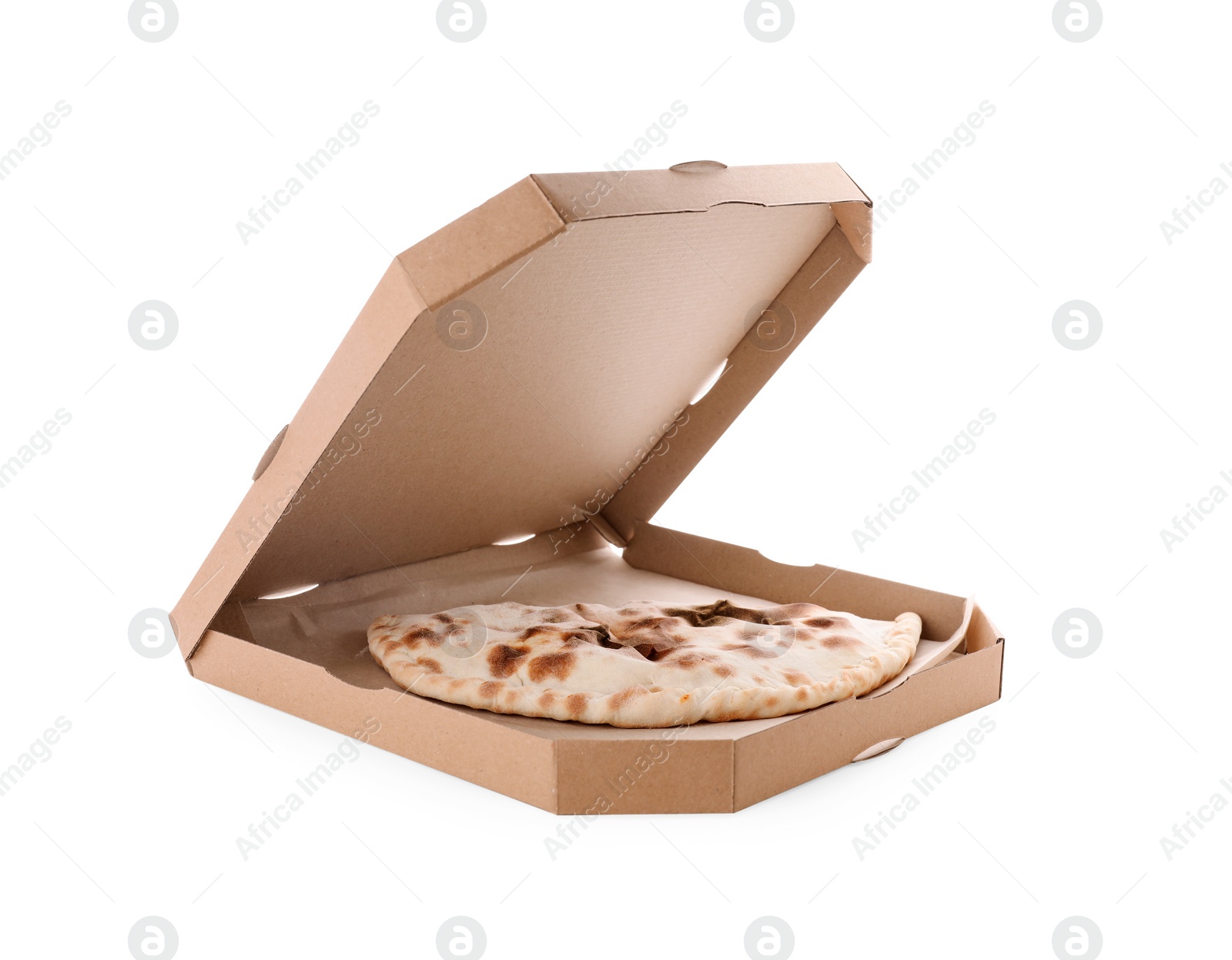 Photo of Cardboard box with delicious calzone on white background
