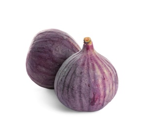 Photo of Whole ripe purple figs on white background