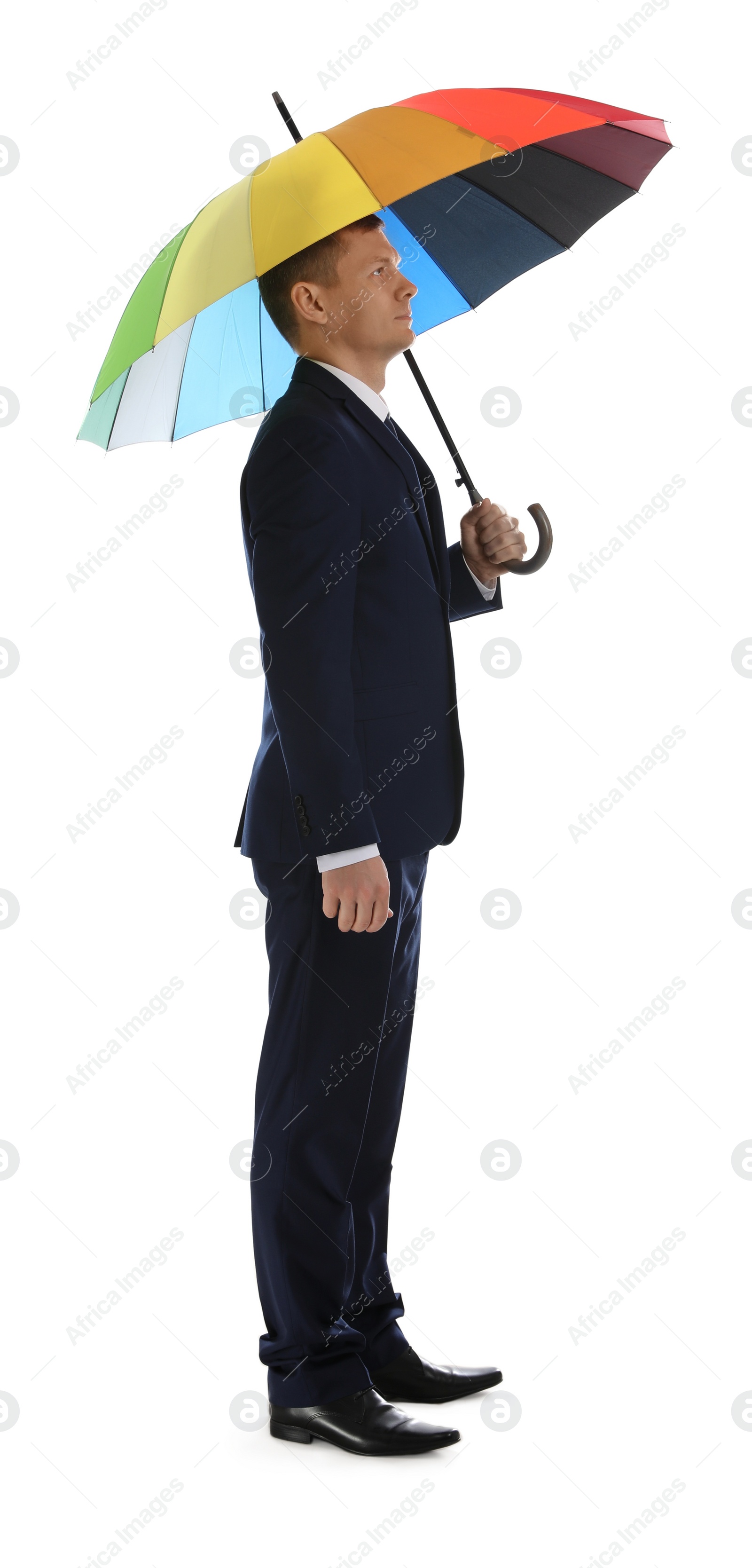 Photo of Businessman with rainbow umbrella on white background