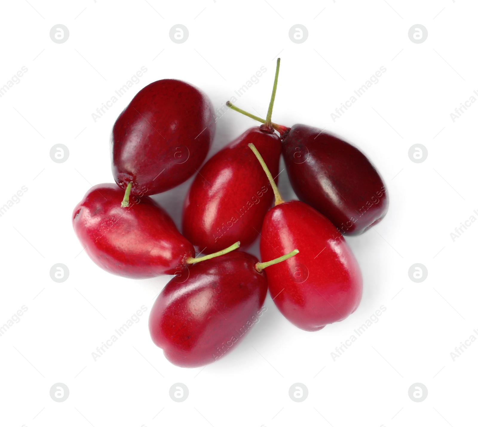 Photo of Pile of fresh ripe dogwood berries on white background, top view