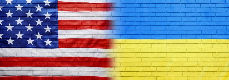 National flags of Ukraine and USA symbolizing partnership between countries painted on brick wall. Banner design