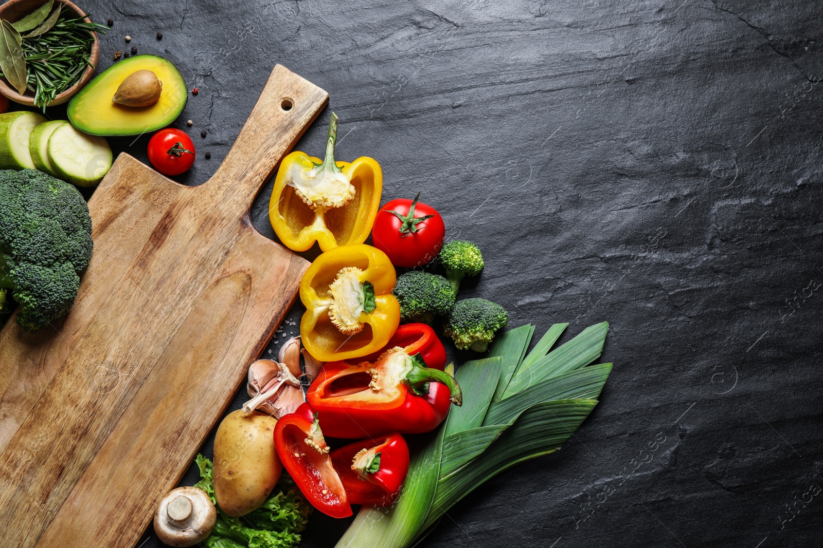 Photo of Flat lay composition with fresh products on grey table, space for text. Healthy cooking