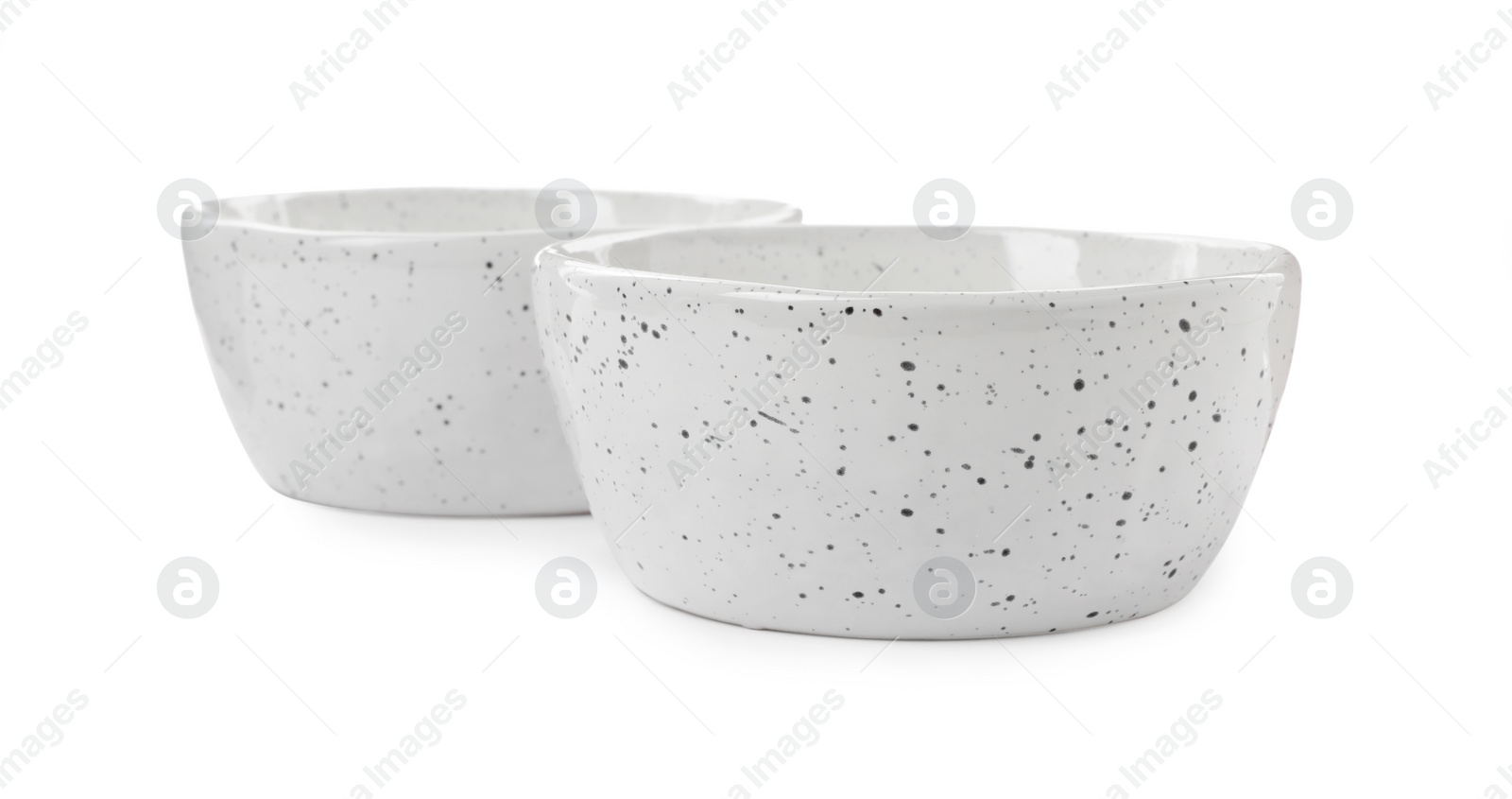 Photo of Beautiful empty ceramic bowls on white background