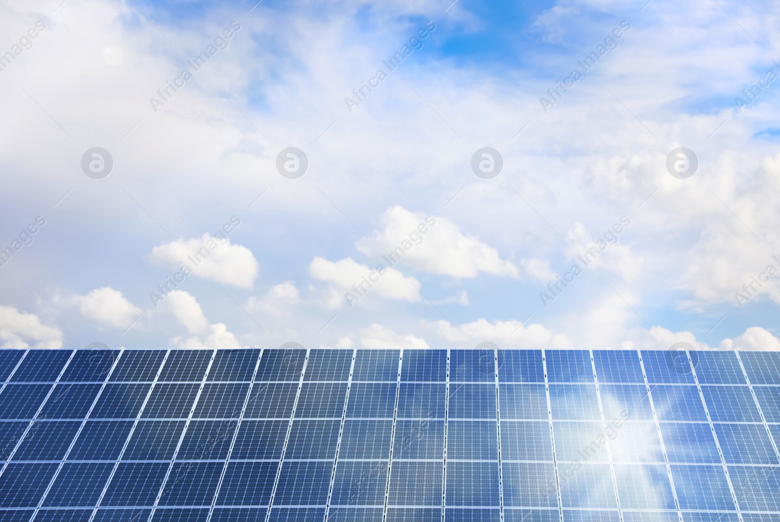 Image of Solar panels outdoors on sunny day. Alternative energy source