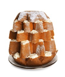 Photo of Delicious Pandoro Christmas tree cake decorated with powdered sugar on white background
