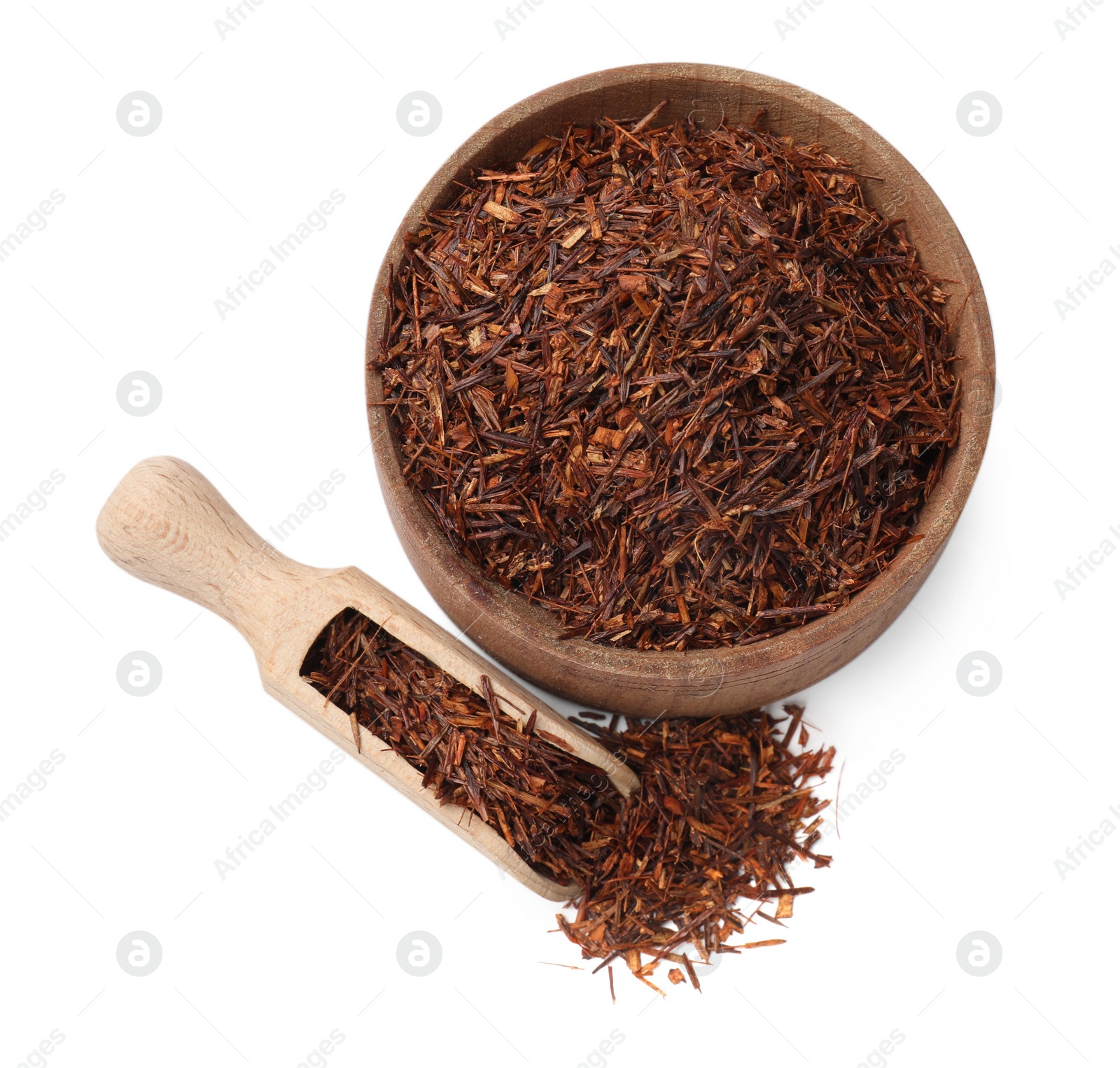 Photo of Rooibos tea in bowl and scoop isolated on white, top view