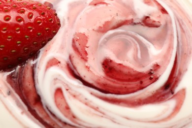 Tasty yoghurt with jam and fresh strawberry as background, closeup