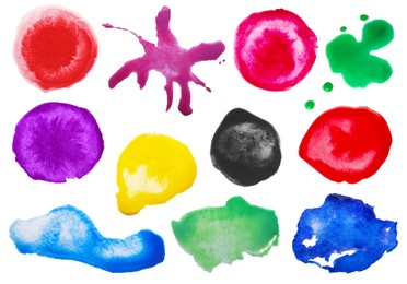 Image of Set with colorful blots of ink on white background, top view