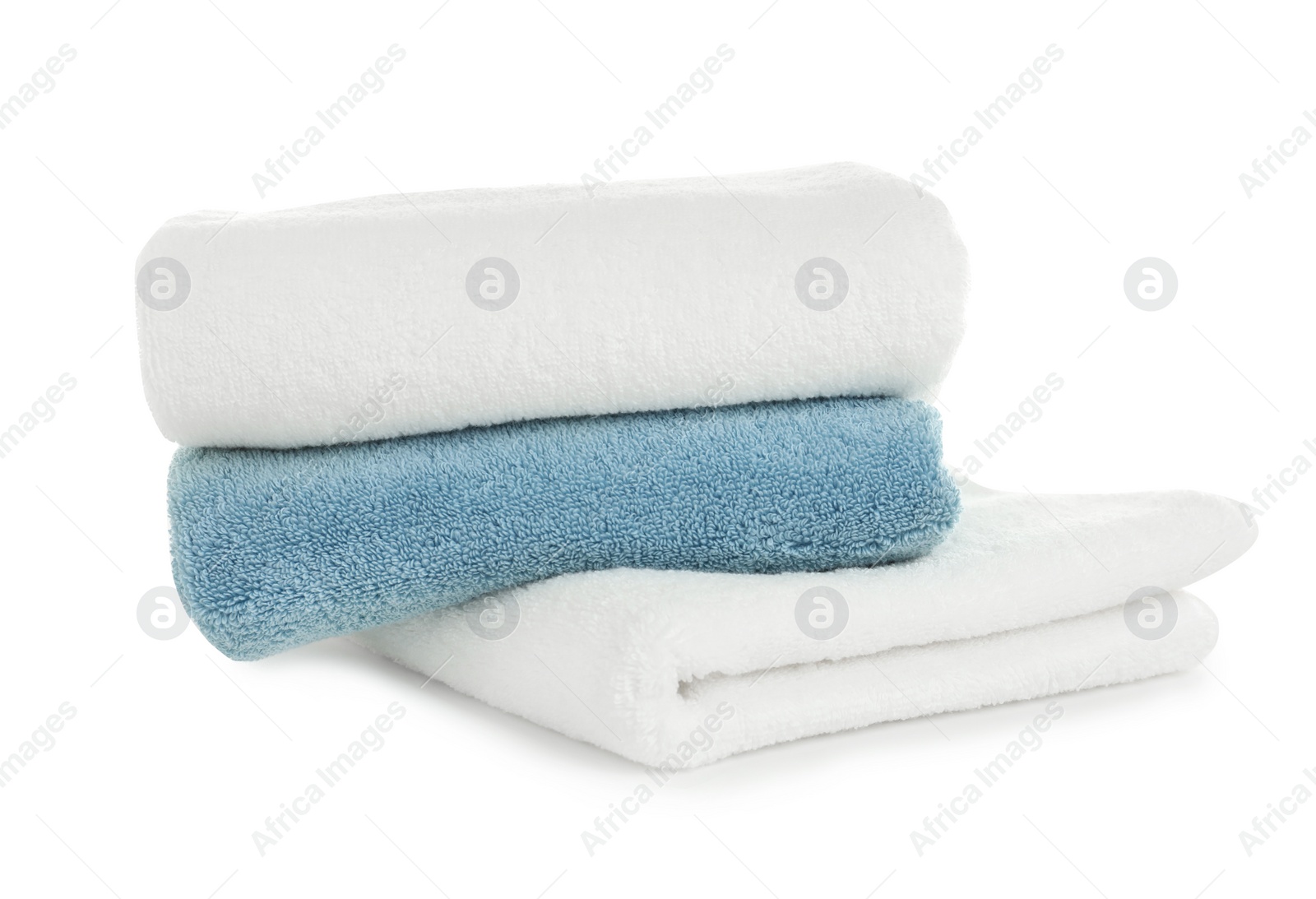 Photo of Folded clean soft towels on white background