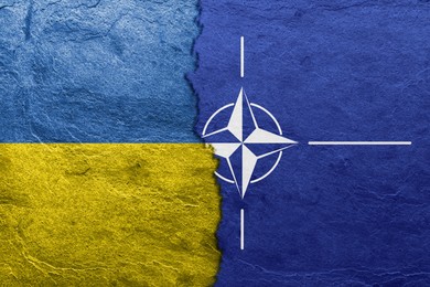 Image of Flags of Ukraine and NATO on textured surface