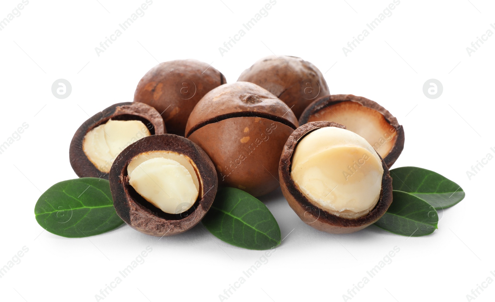 Photo of Pile of organic Macadamia nuts on white background