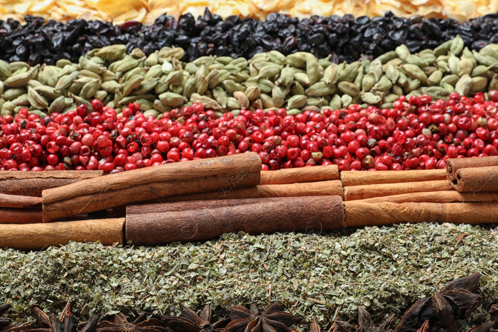 Photo of Set of different spices as background, closeup