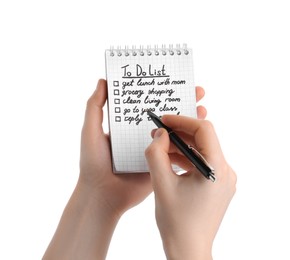 Woman checking to do list on white background, closeup