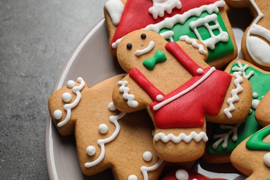 Photo of Tasty homemade Christmas cookies on grey table, closeup view