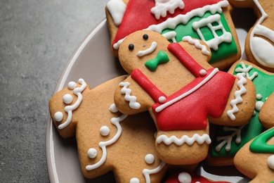 Tasty homemade Christmas cookies on grey table, closeup view