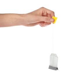 Woman holding tea bag on white background