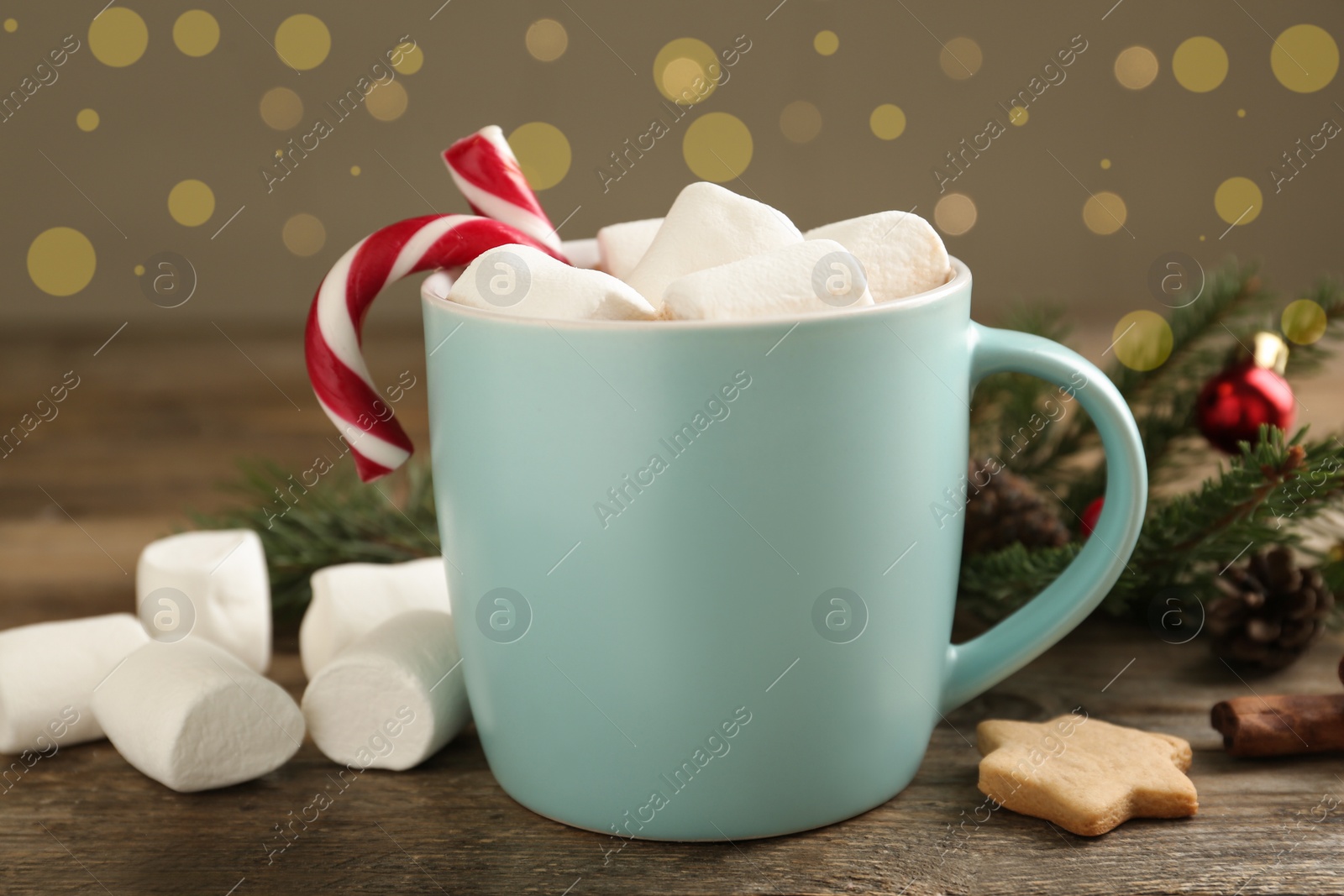 Photo of Composition with delicious marshmallow cocoa on wooden table