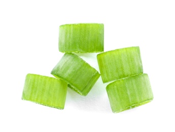 Photo of Cut fresh green onion on white background, top view