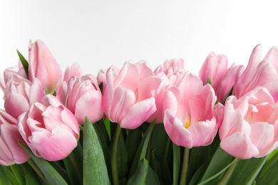 Photo of Beautiful pink spring tulips on white background, closeup