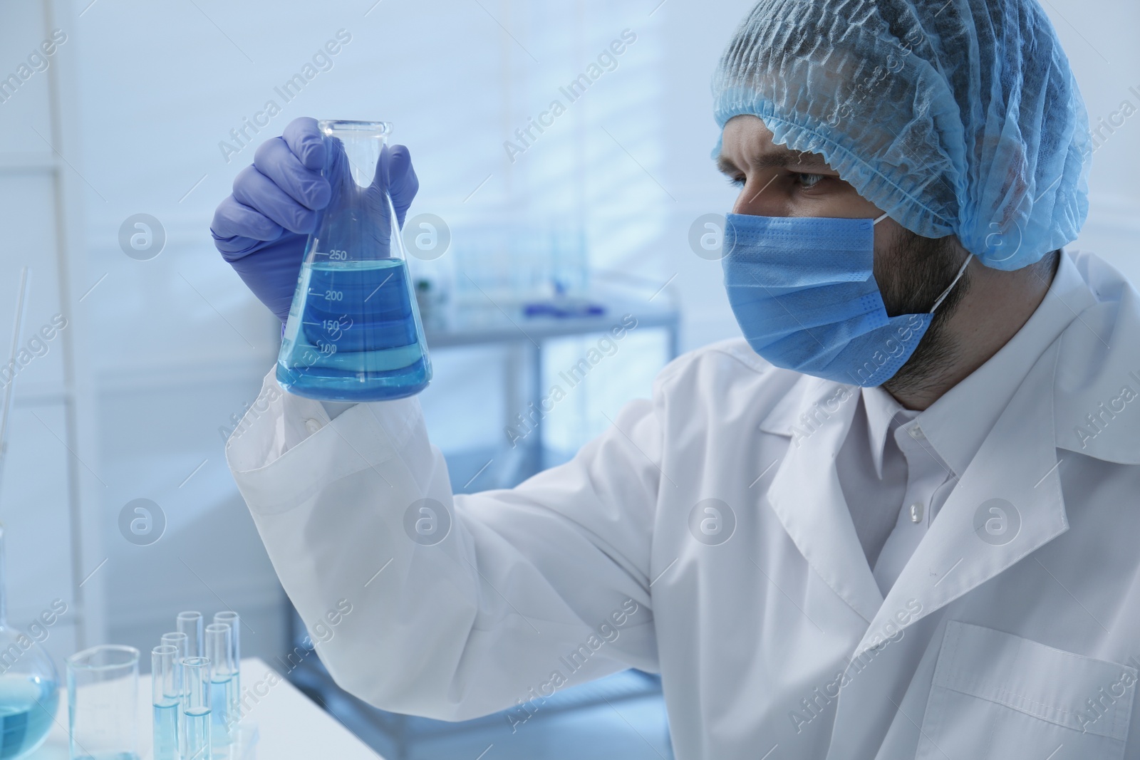 Photo of Scientist working with sample in laboratory. Medical research