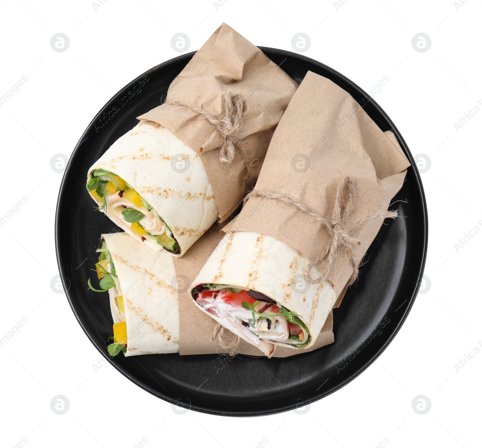 Photo of Delicious sandwich wraps with fresh vegetables isolated on white, top view