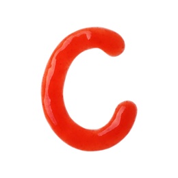 Letter C written with red sauce on white background