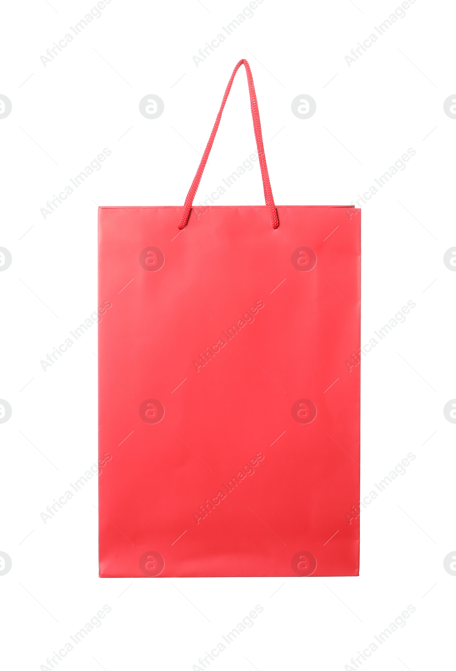 Photo of One red shopping bag isolated on white
