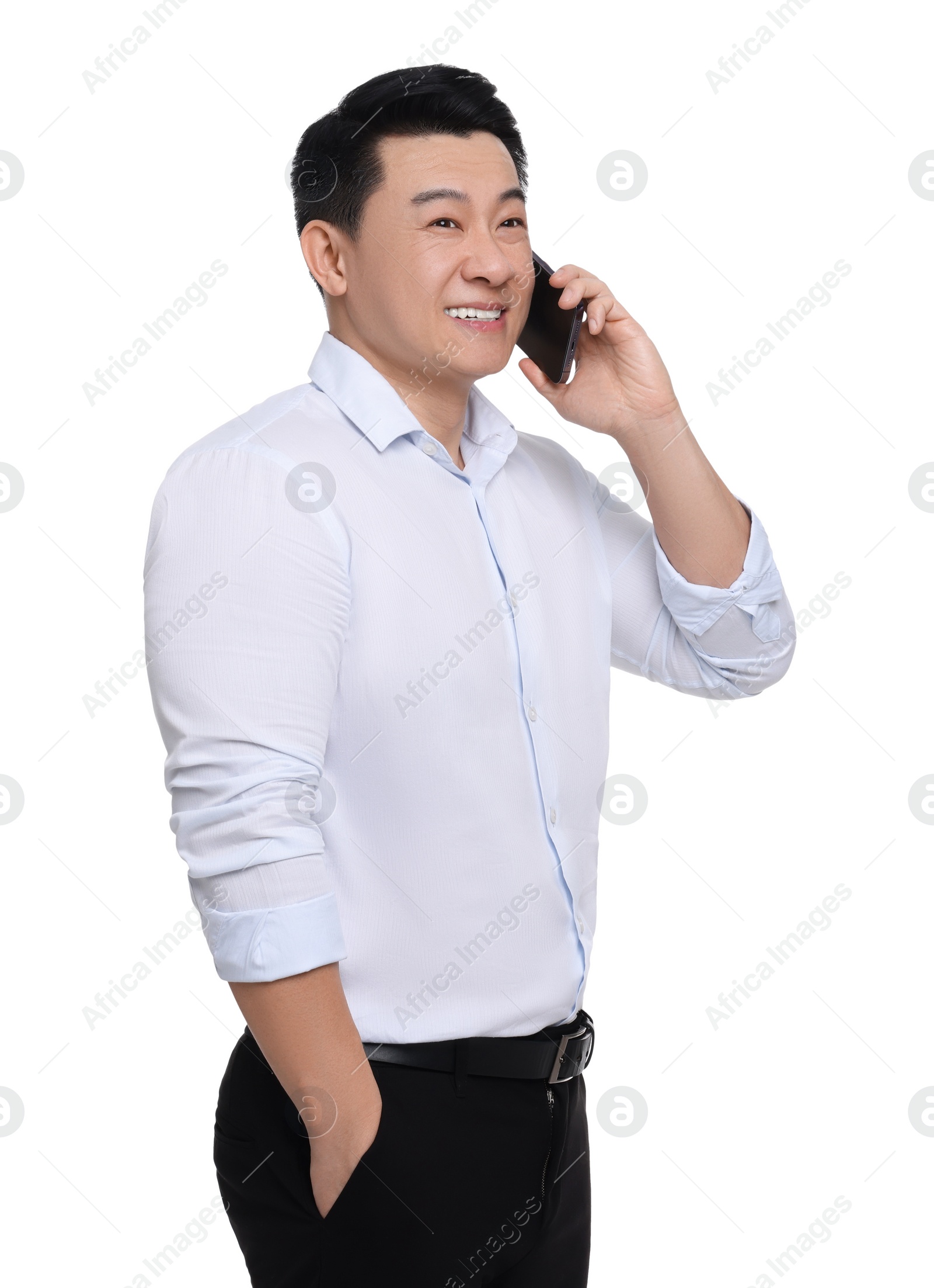 Photo of Businessman in formal clothes talking on phone against white background